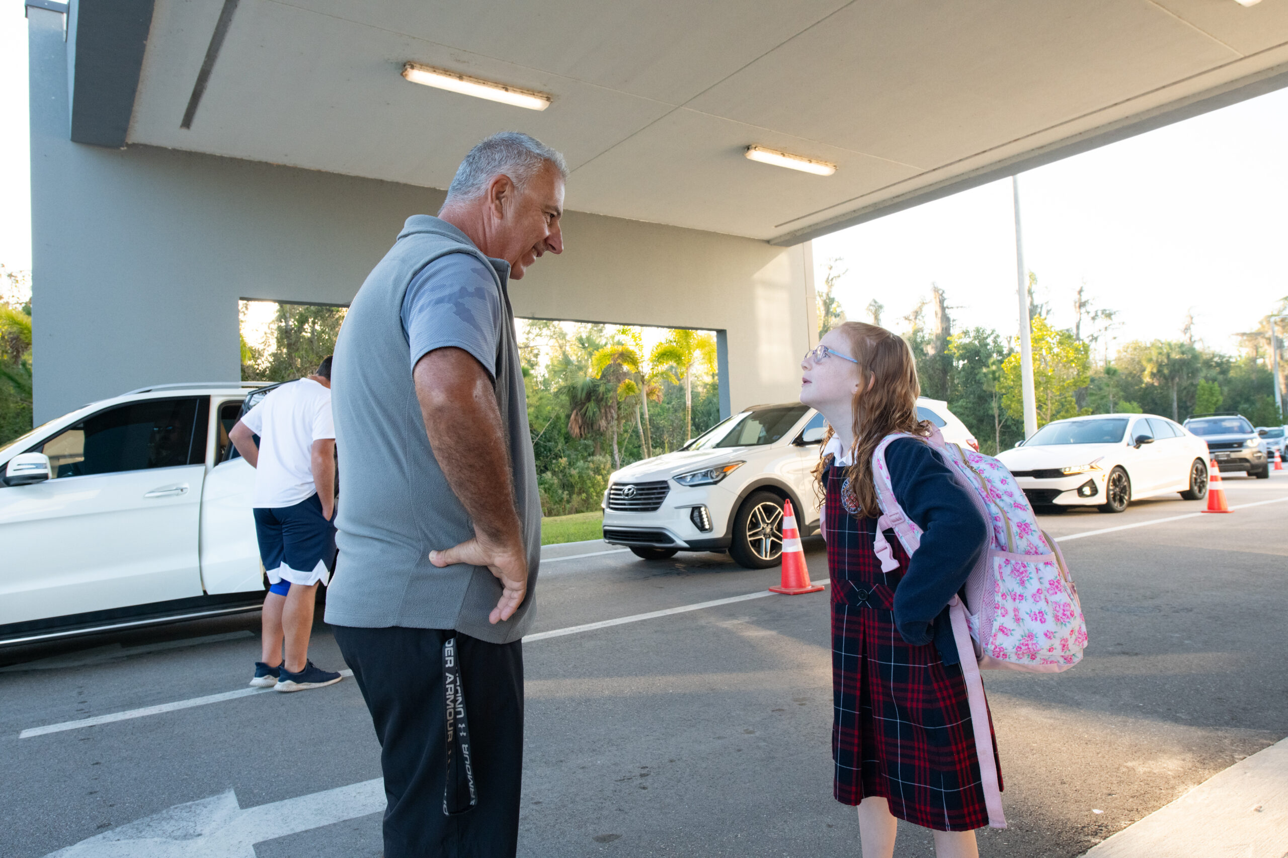 A teacher and student talking to each other