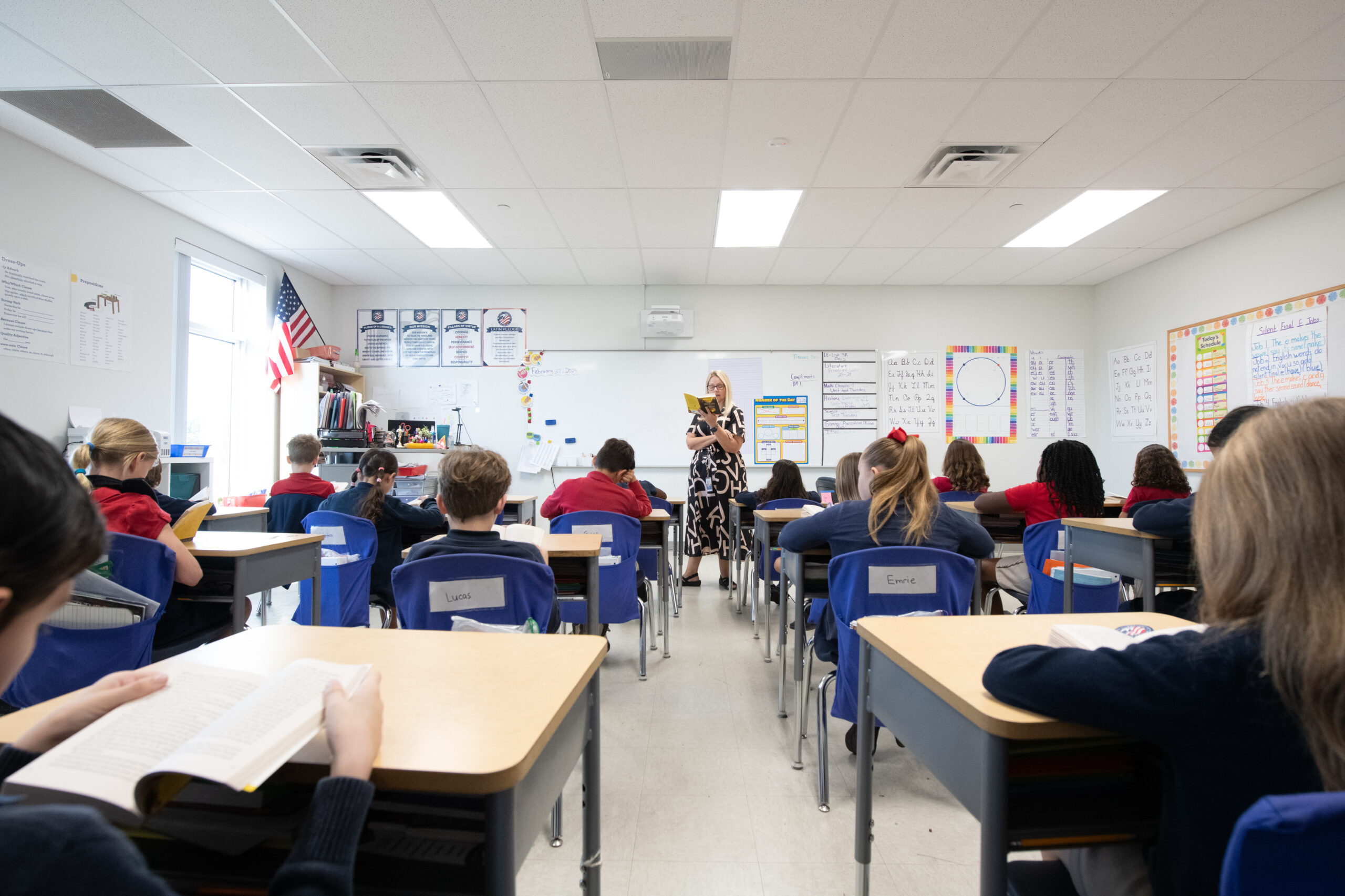 A teacher reading to a classroom